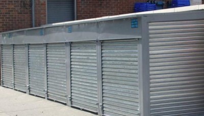 Solid Galvanized Steel Pushup Roll down Security Gate reverse mounted with back plates. (Bronx, NY)