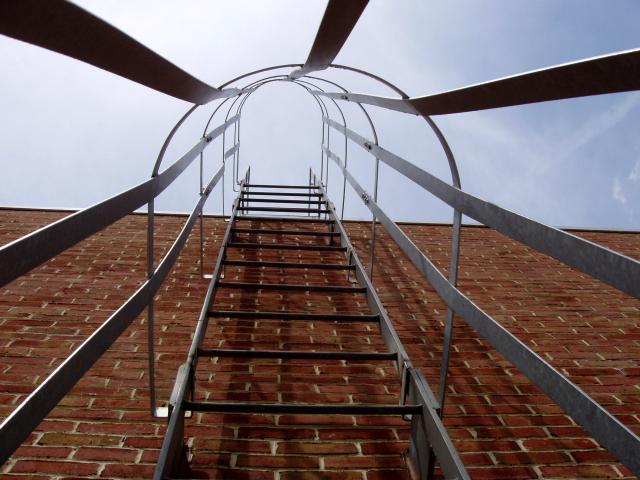 Roof ladder / Galvanized cage. Heated/bent and welded to ladder frame. (Bronx, NY)