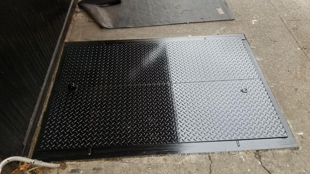 Diamond plate sidewalk cellar door replacement fabricated and installed in New York City by Steel Masters