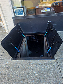 cellar door sidewalk strorefront commercial street basement access