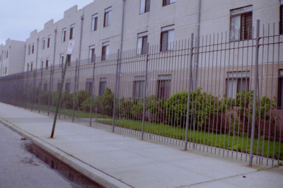 10 foot tall solid three quarter bar plain welded fence mounted on 2 inch solid steel posts in 36 inch concrete footings. (brooklyn, ny)