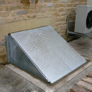 sloped sidewalk cellar door