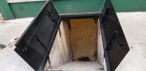 metal sidewalk hatch cellar door street open nyc