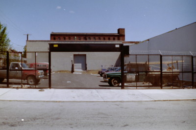 Expanded metal mesh welded steel fence with motorized roll-down gate, Brooklyn