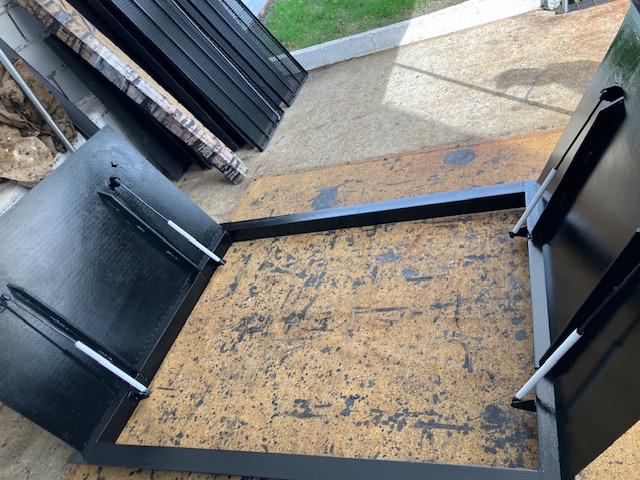 hydraulic sidewalk cellar door
