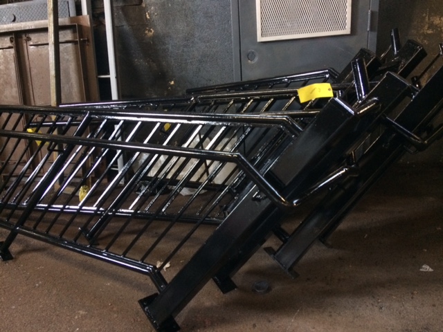 structural stair guard railing with half inch pickets and welded pipe handrailing