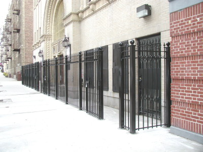 steel fence with swing gates. 6′ tall with design. commercial industrial (brooklyn, ny)