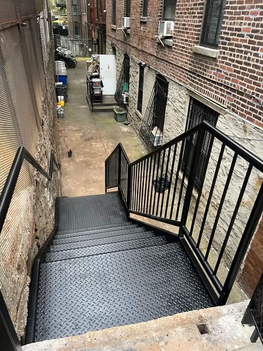 Top view diamond plate outside metal steps with 2 landings
