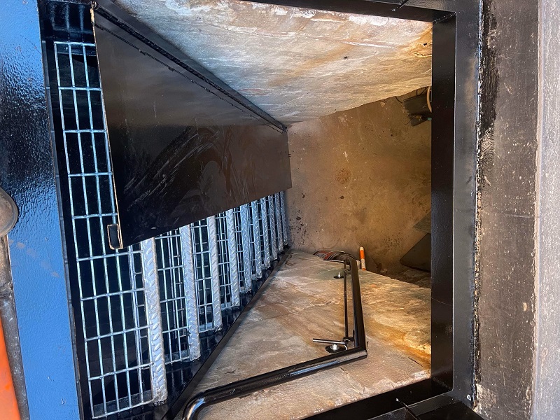 Storefront basement egress galvanized grating metal stairs with hinged folding loading ramp