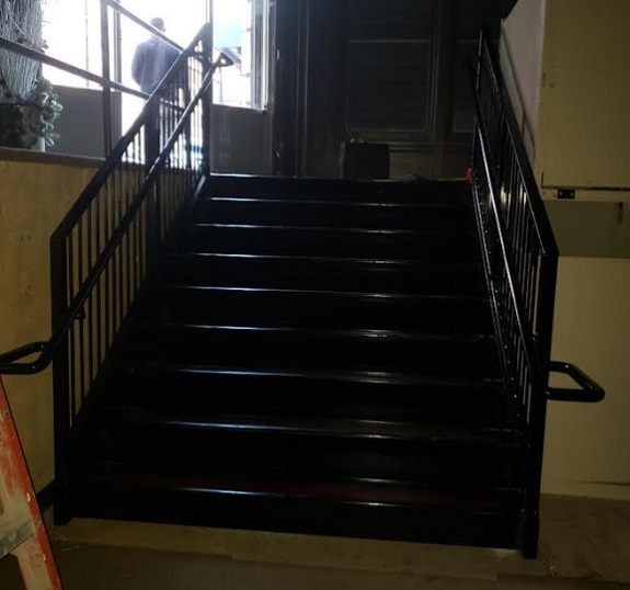 7 foot wide indoor steel store staircase, downtown Brooklyn