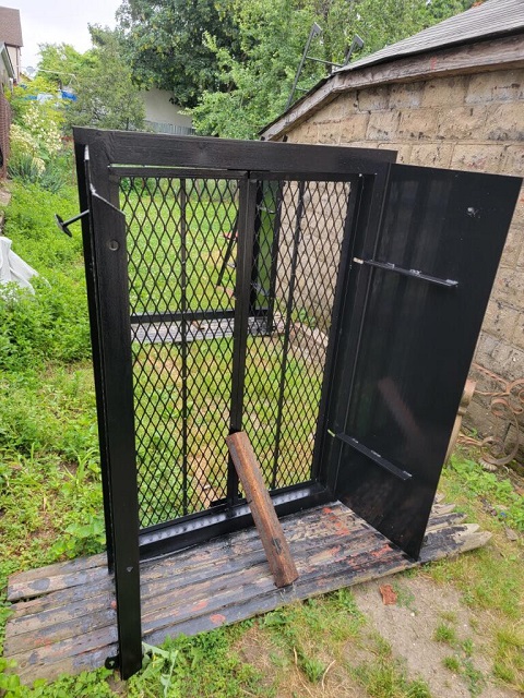 Expanded metal security doors in steel cellar double door unit, Astoria Queens