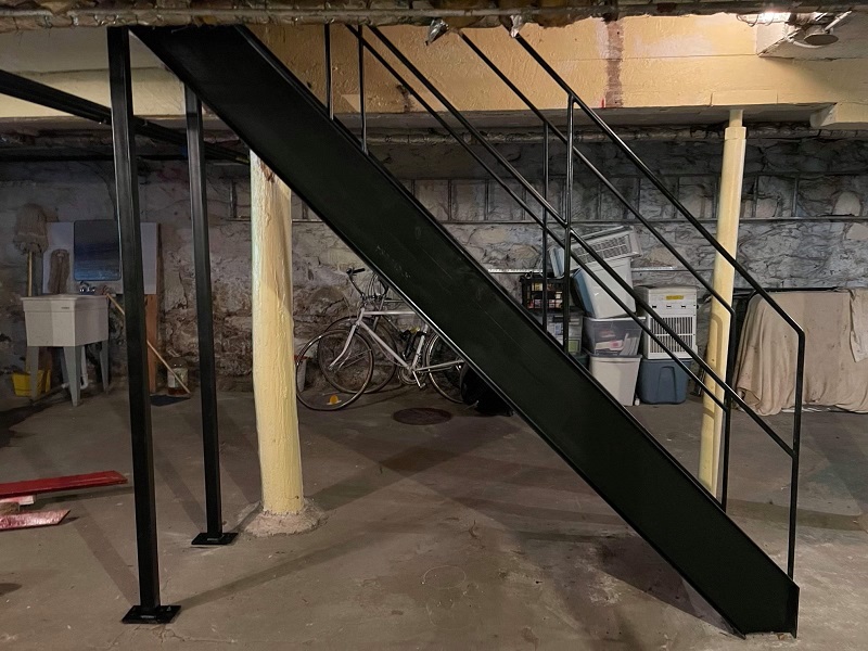 indoor metal stairs with tube steel support posts and welded mounting plates.brooklyn ny