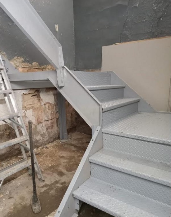 Interior commercial closed tread diamond plate switchback staircase, Upper West Side