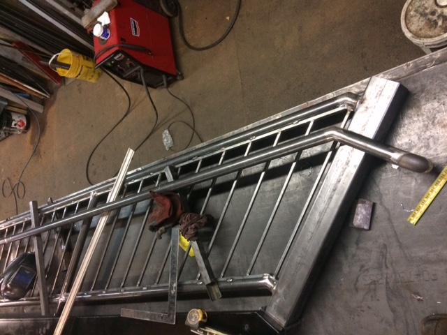 steel staircase guardrailing with 4 inch newel post and ada compliant handrailing