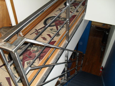 Tubular steel polished interior stair rails