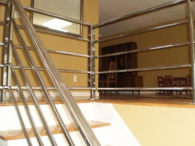 Interior flush mounted steel stair rails