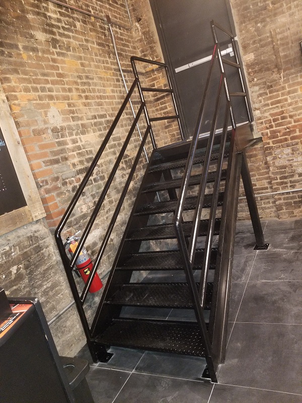 1st diamond plate iron stairs with piperails