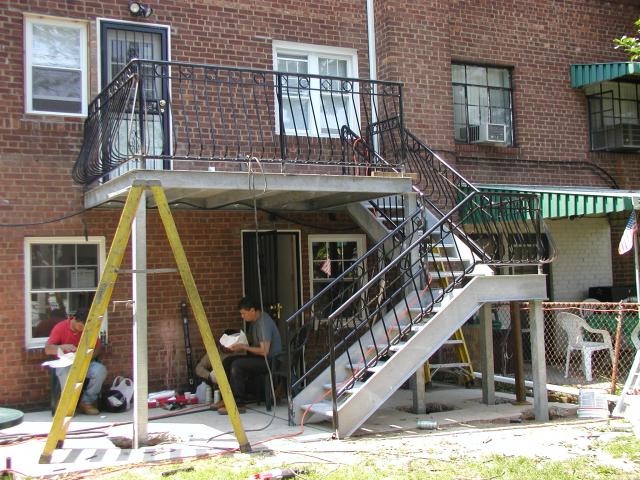 galvanized open tread staircase and deck porch