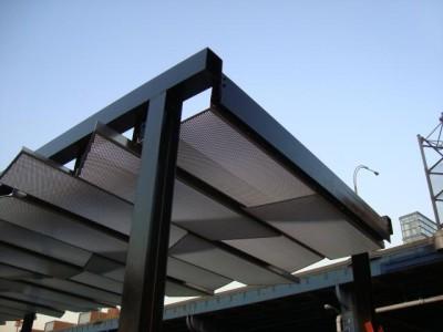 Welded tubular steel canopy aluminum fill panels