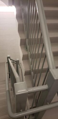 staircase guard railing with pickets and newel posts