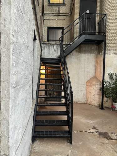outdoor metal landing stairs hudson square NY