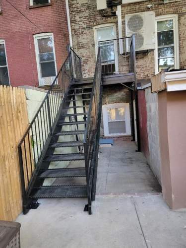 Outdoor diamond plate steel deck structural supports open tread metal bent steps marble hill Brooklyn, NYC