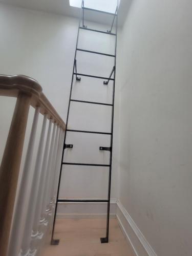 welded fixed wall mounted roof ladder bedford sty brooklyn nyc