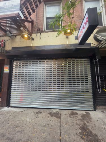 secure rolldown gate storefront bronx