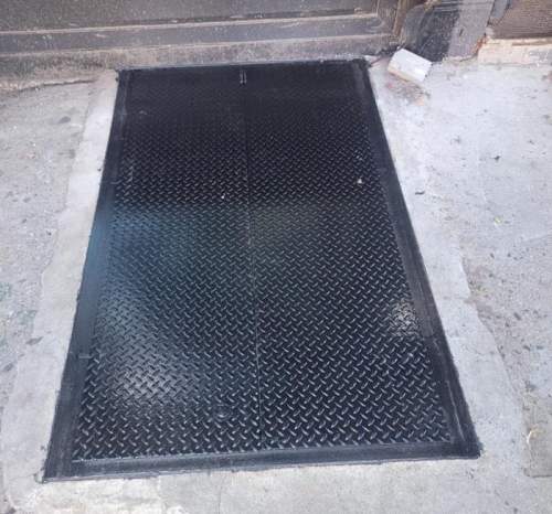 Flat sidewalk cellar door, Chelsea NYC